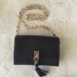 Henri Bendel Black handbag w/tassel & gold chain